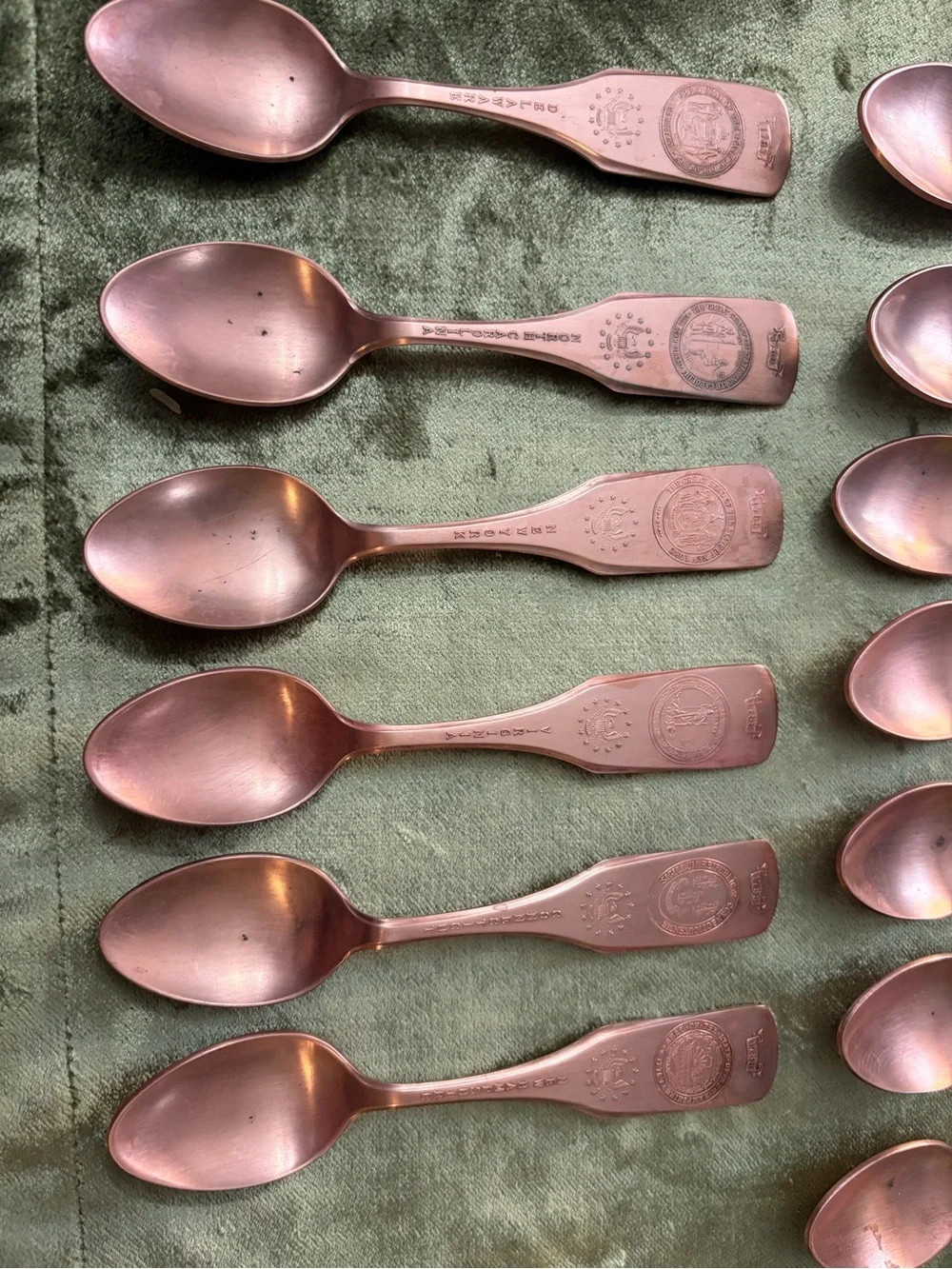 Vintage-13 Spoons United Silver Co.-Copper plated -vintage wall holder